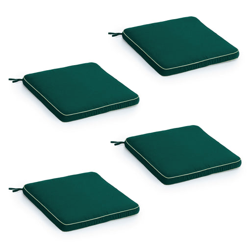 Four green cushion pads on a white background